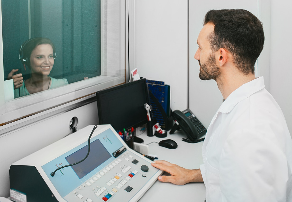 Woman taking a hearing exam.